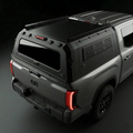 Toyota Tundra 6.5ft Armacap steel truck canopy - 3/4 front view with gullwing doors closed